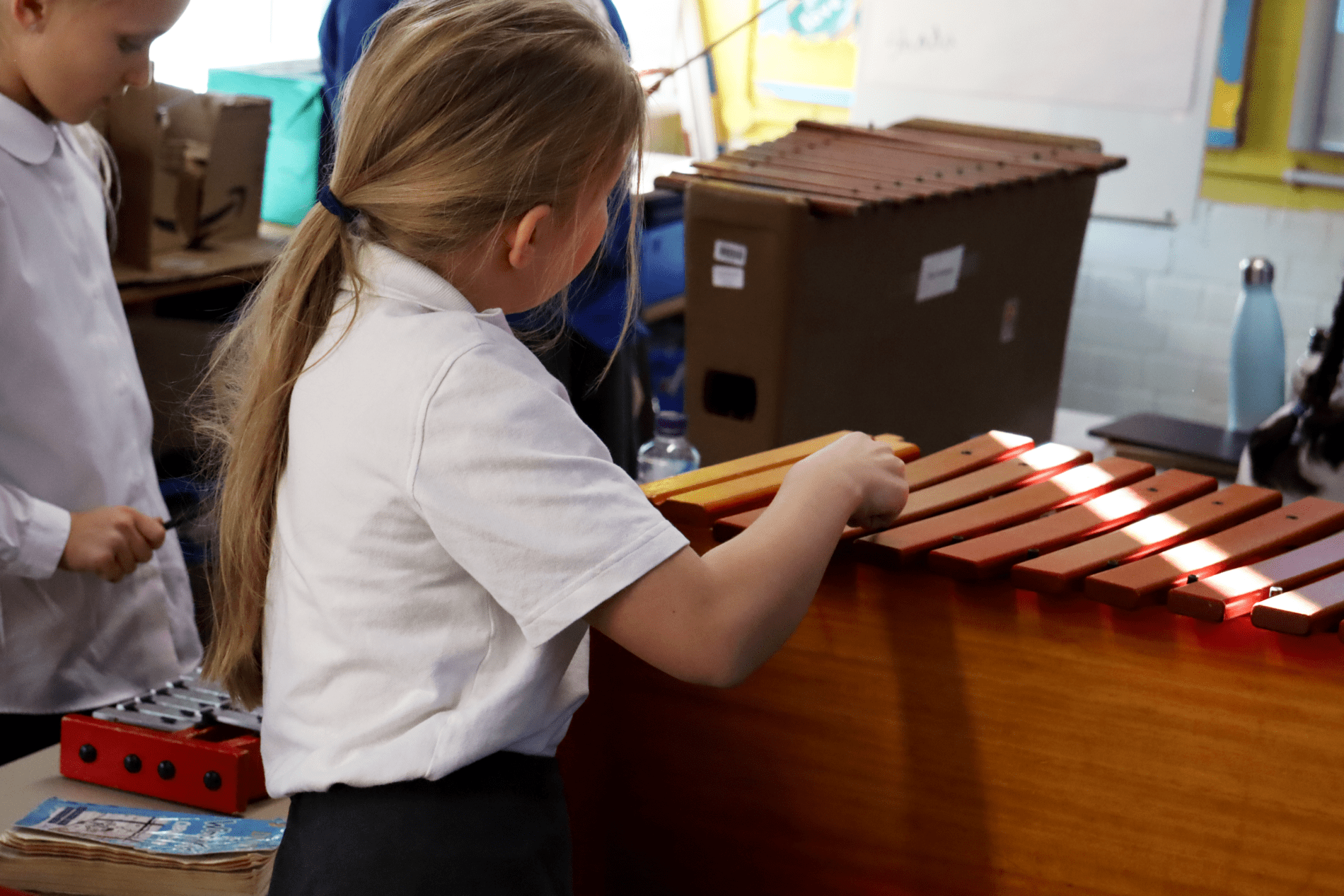 marimba pupil playing marimba in music lesson at horton kirby primary school