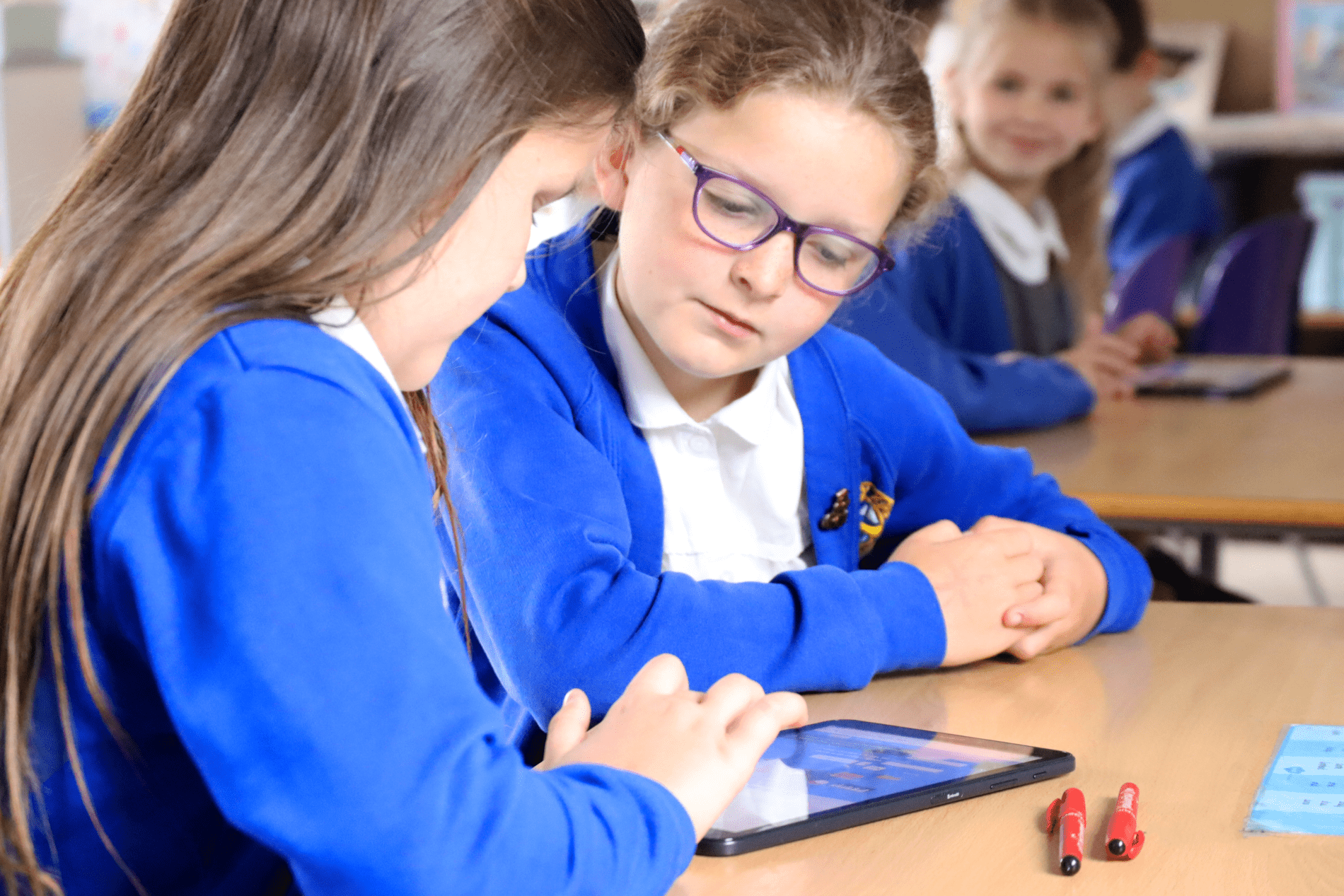 pupils scratch two pupils wokring together ona. tablet doing Scratch at horton kirby primary school