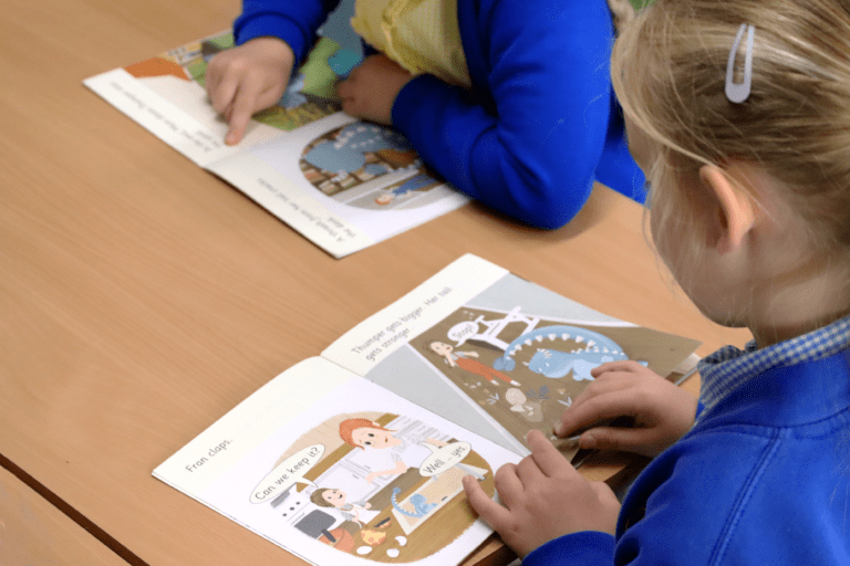 reading english key stage 1 pupils in key stage one reading in an english lesson at horton kirby primary school