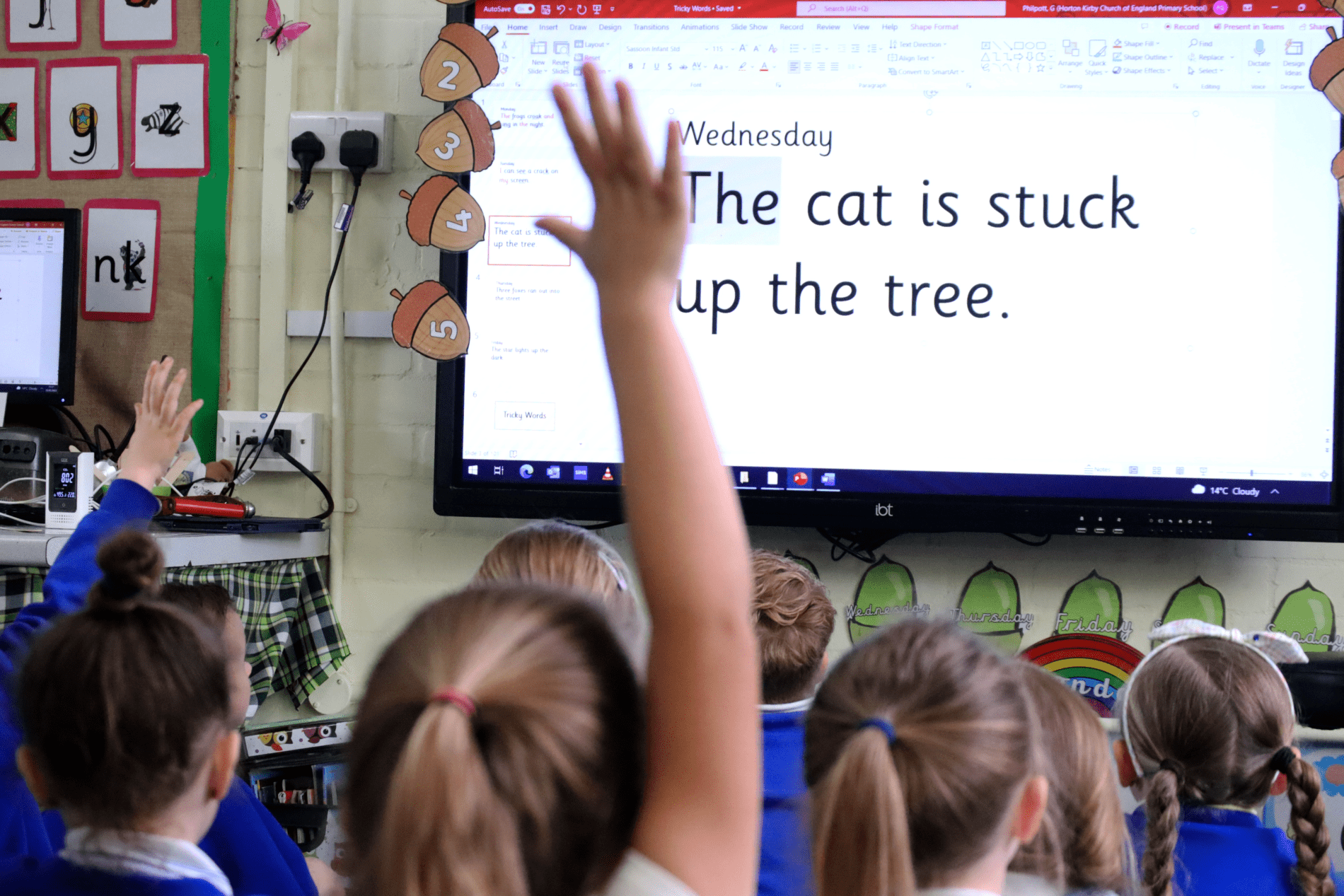pupils hands up in a phonics class at horton kirby primary school