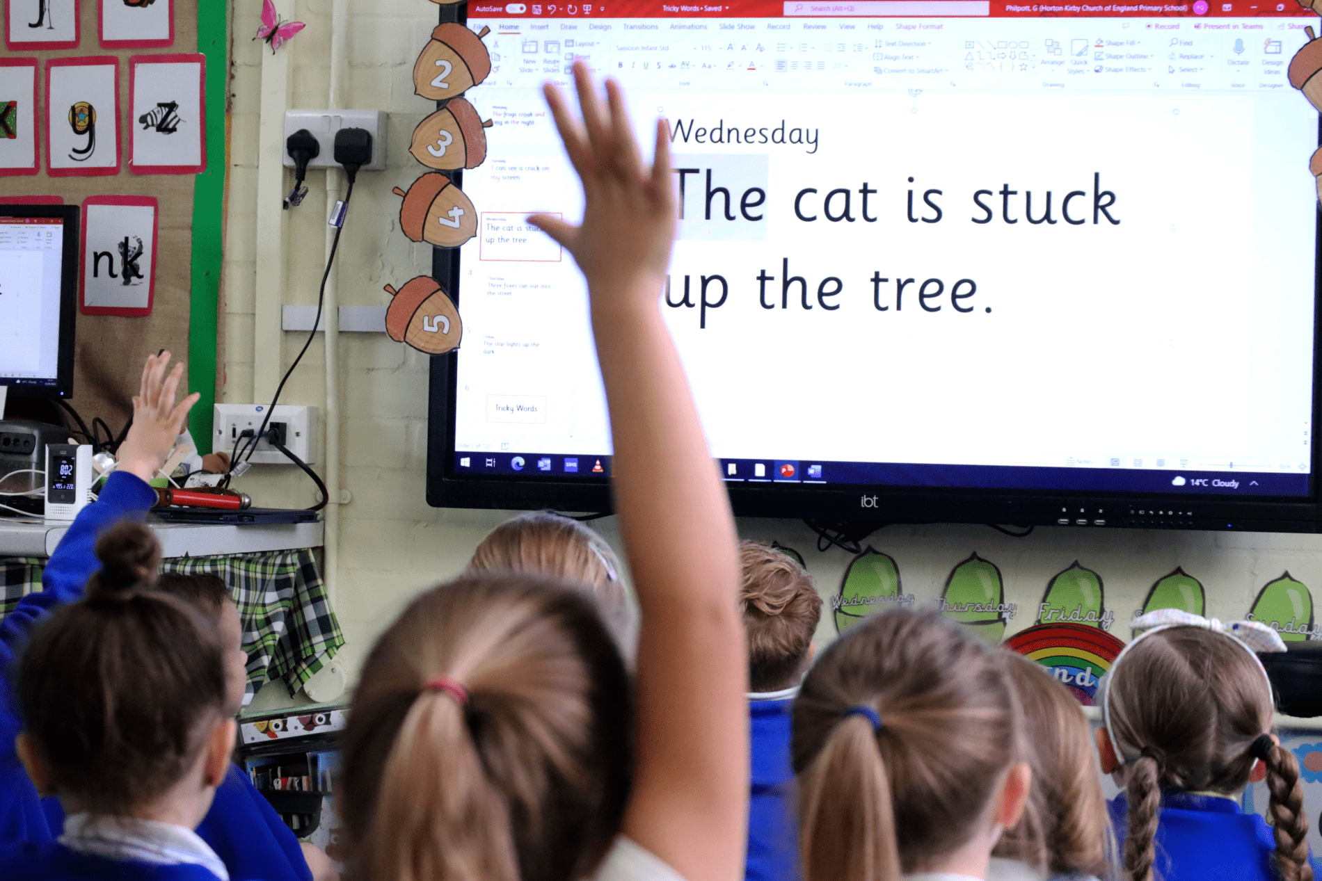 phonics hand up pupils hands up in a phonics class at horton kirby primary school