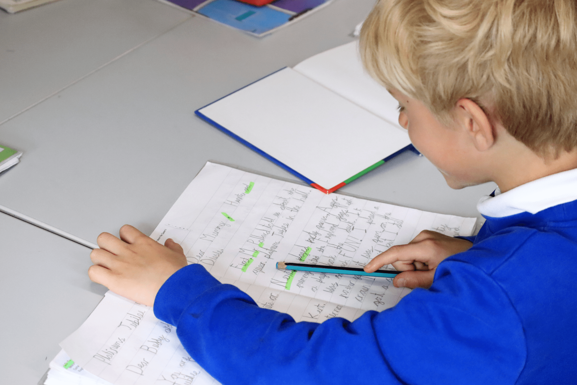 pupil practising their handwriting at horton kirby primary school