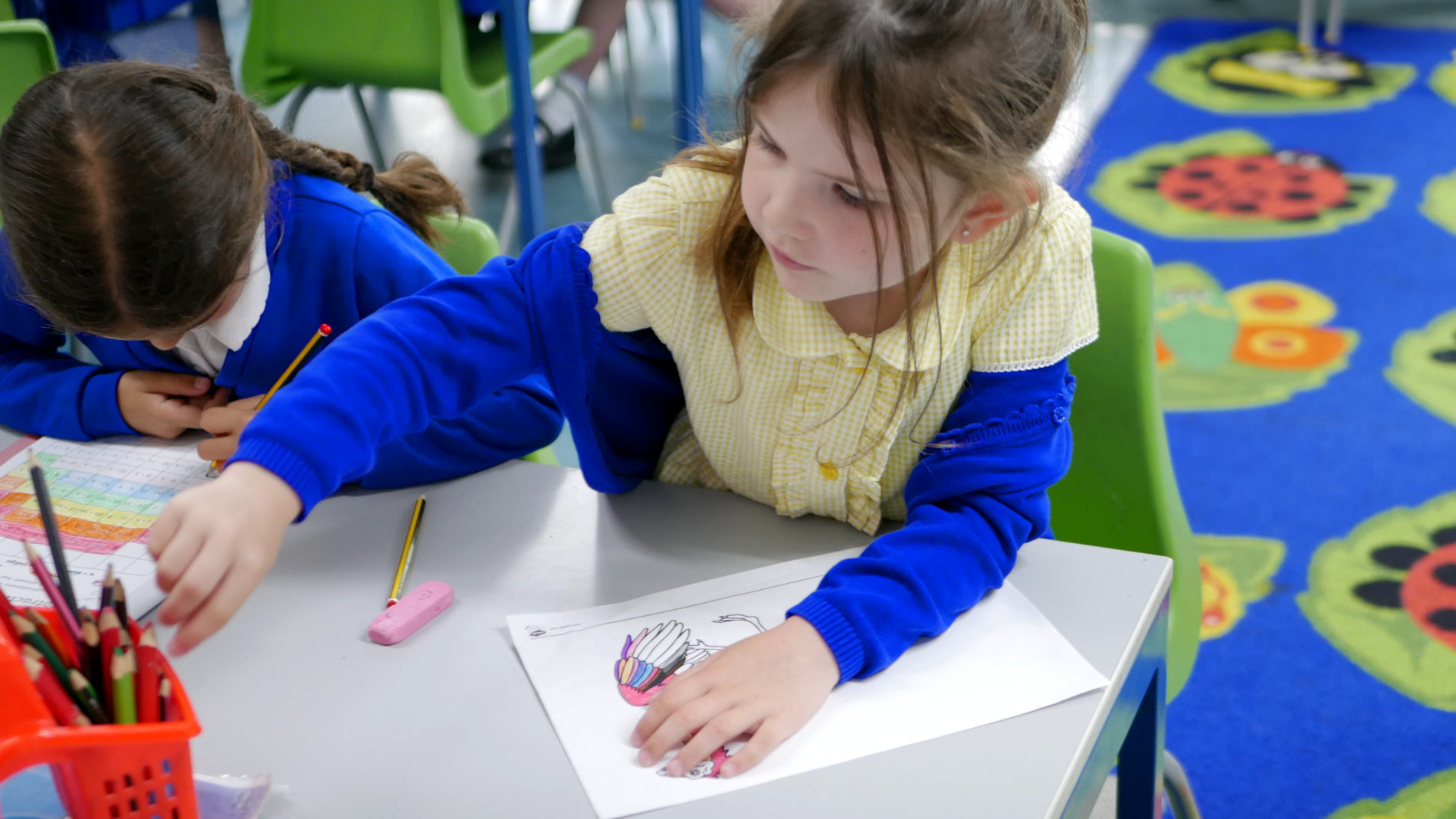 pupil colouring in a bird in art class at horton kirby primary school