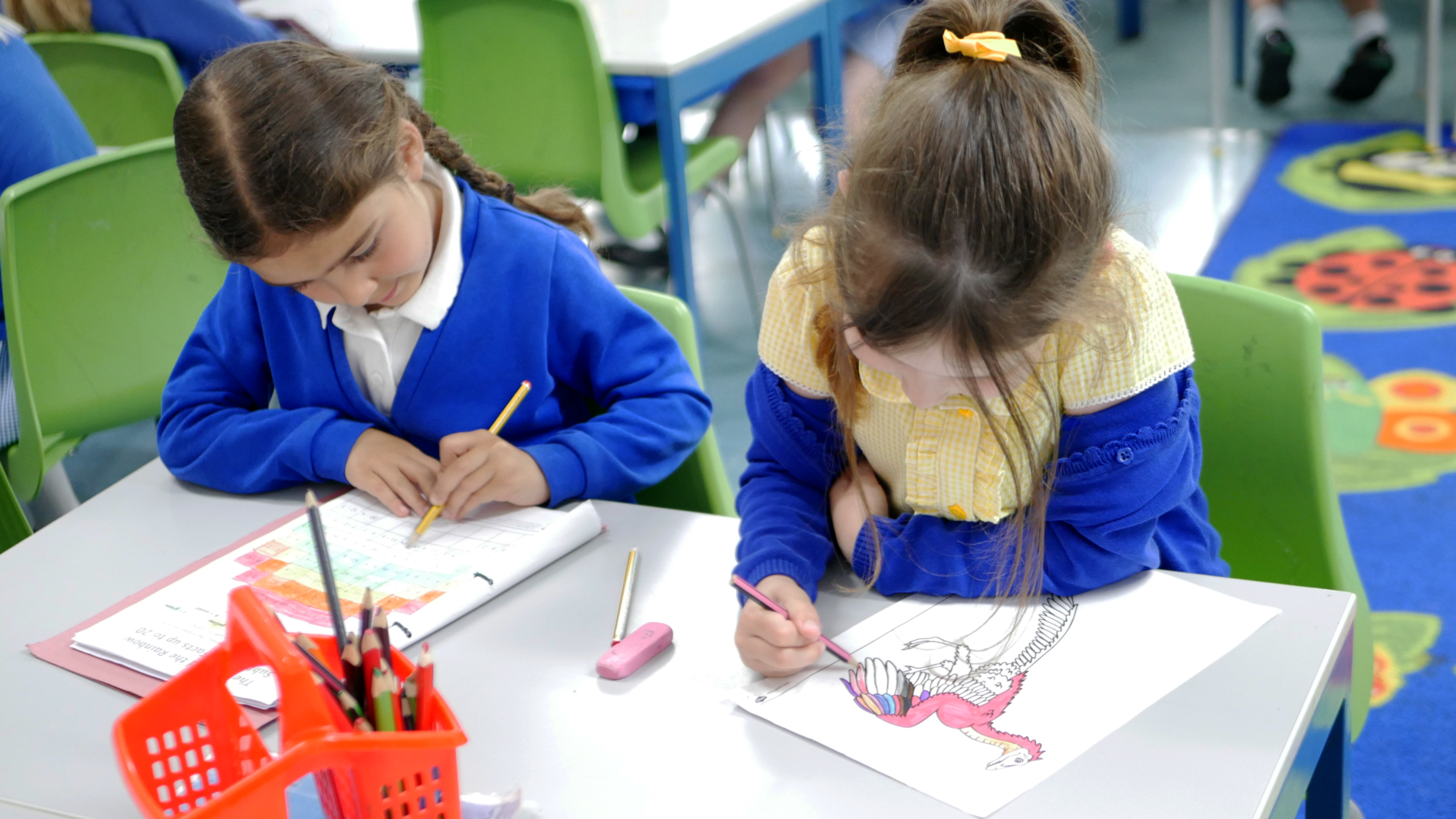 pupils colouring at lunch time at horton kirby primary school