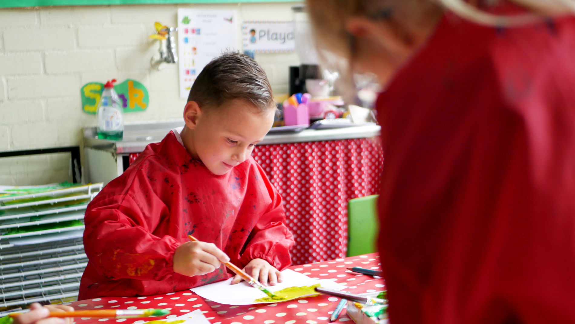 pupil painting in art class at EYFS at horton kirby primary school