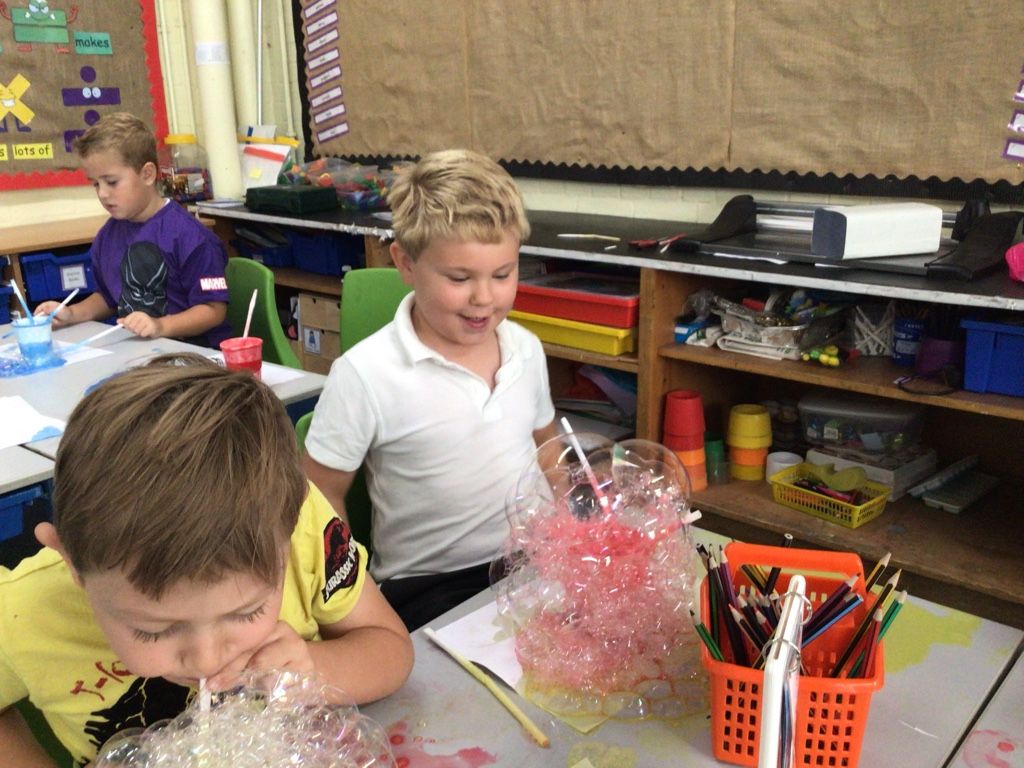 pupils learning how to make bubbles in year 1