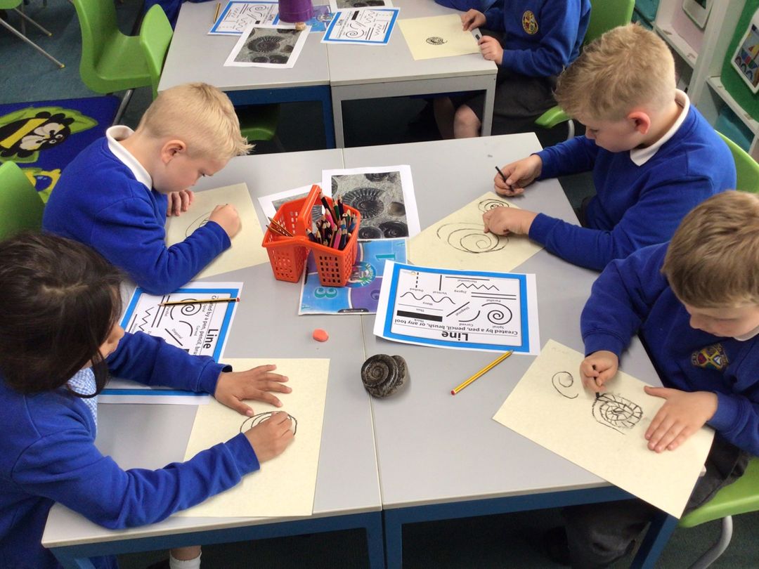 pupils in year 1 learning how to draw lines